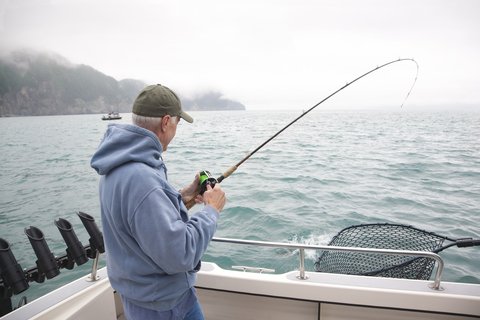 Â© Willard | Dreamstime.com - Senior Man Fishing For Salmon In Alaska Photo